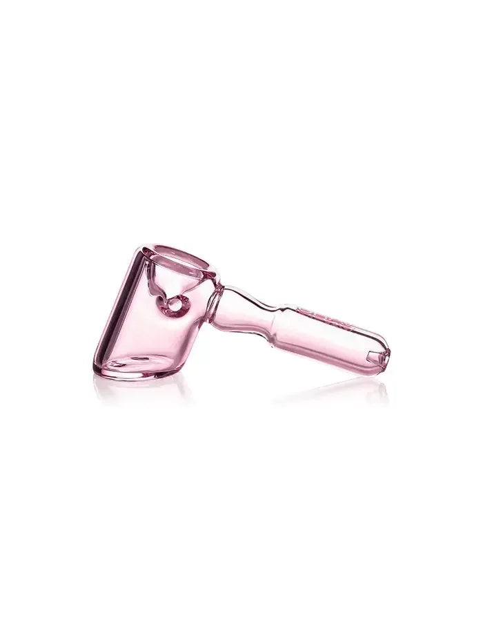 Eine zartrosa Glaspfeife im Hammer-Design mit flachem Boden für stabilen Stand und einem seitlichen Kickloch.