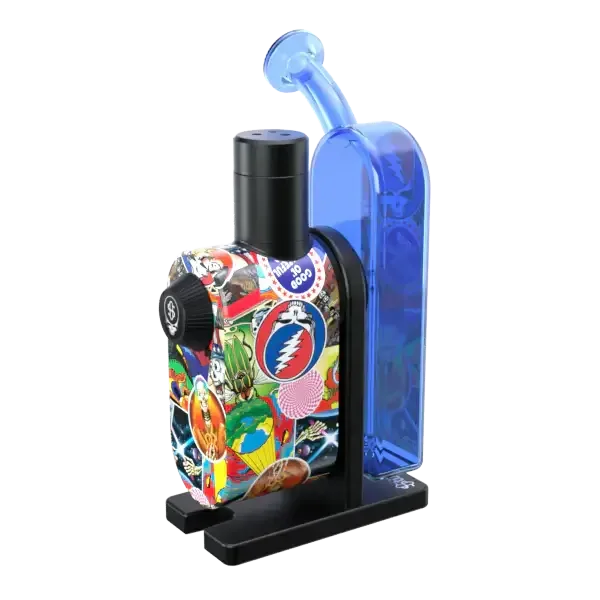 Rückansicht des elektronischen Stündenglass Moduls im Grateful Dead Design mit dem charakteristischen blauen Glasaufsatz auf einem schwarzen Standfuß.