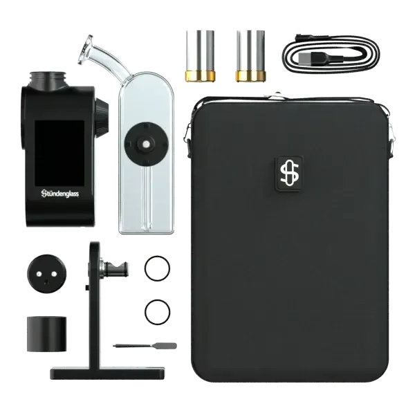 Draufsicht des vollständigen Stündenglass Modül Kits mit klarem Dok-Glas, Magnetstation, Tanks und schwarzer Tragetasche.